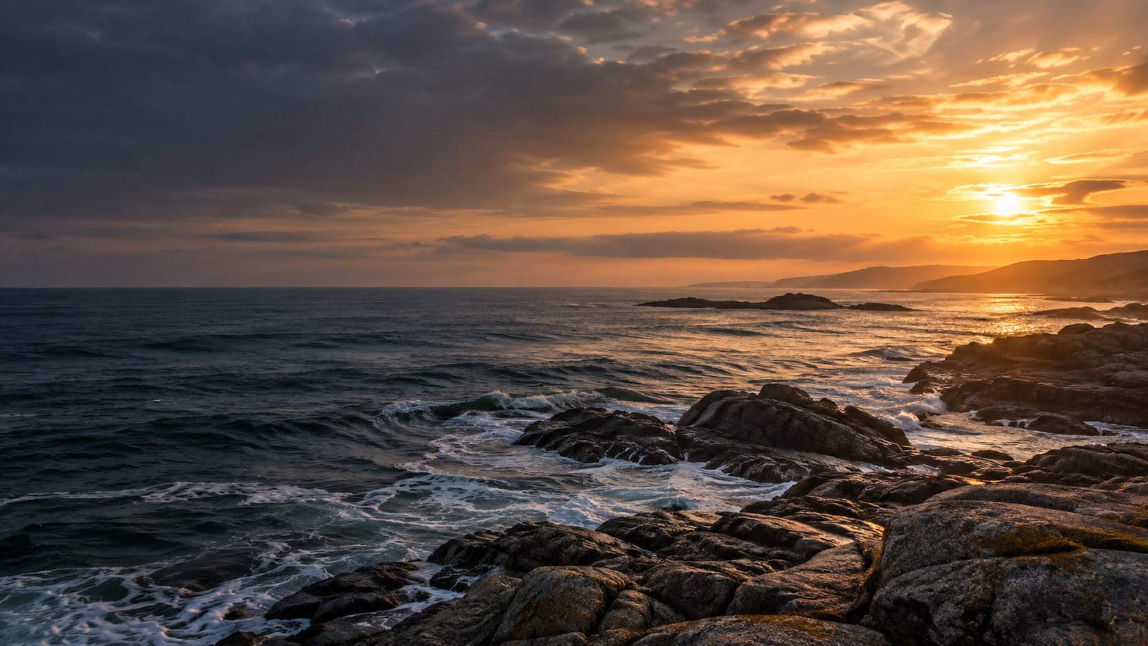 Sunlight opening through clouds above the Atlantic coast
